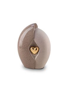Kleine keramische urn met hartje