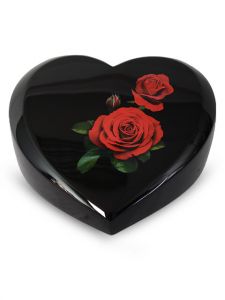 Glasfiber hart urn met rode rozen
